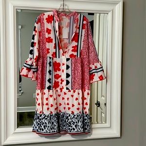 Multi-print dress with flare sleeves. Size Large. NWT